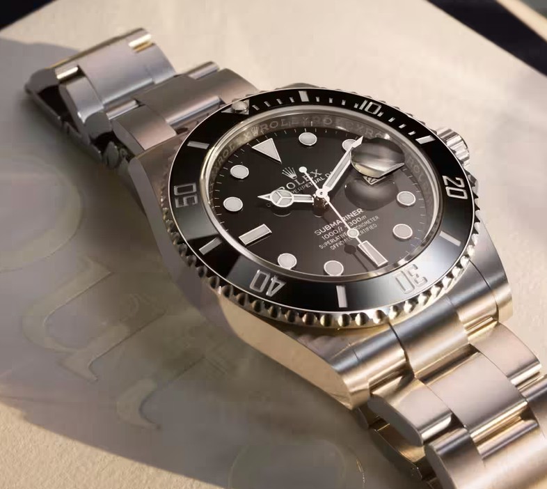 Steel Rolex Submariner with black dial and bezel